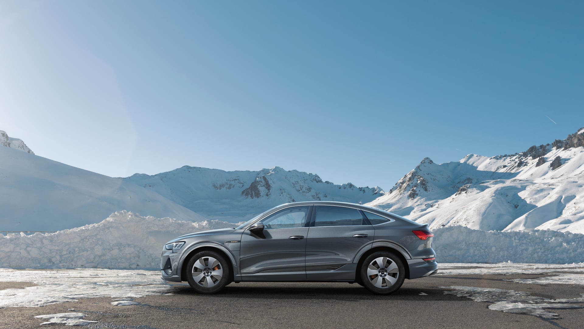 An e-tron parked in the mountains